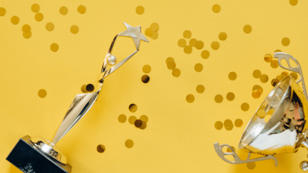 trophies on a yellow background