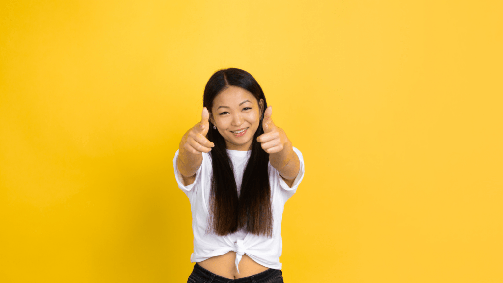 a close up of a person pointing at something