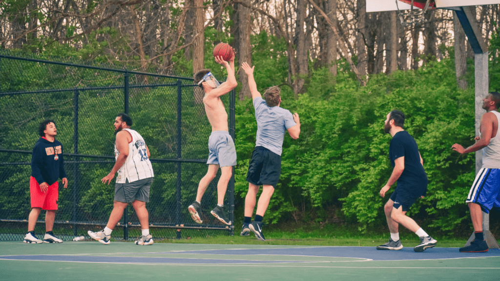 a group of individuals playing basketball