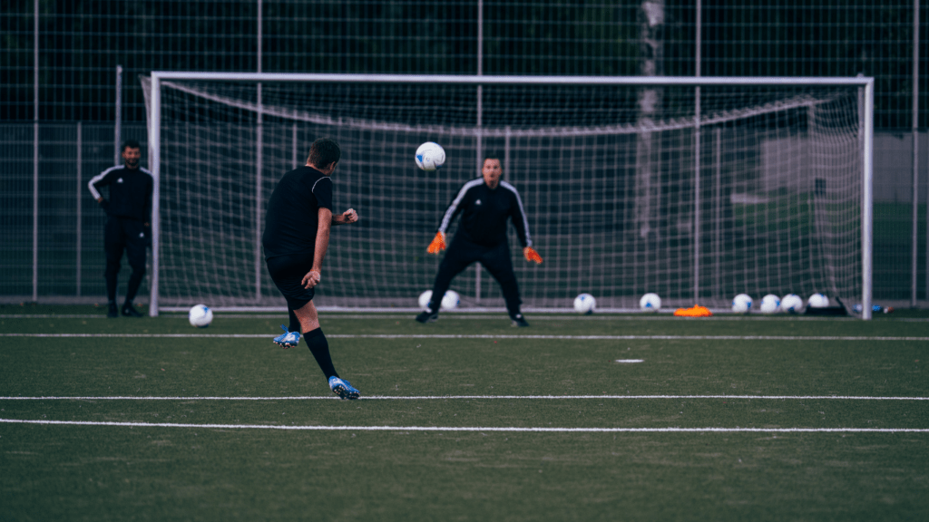 a group of people playing soccer on a field