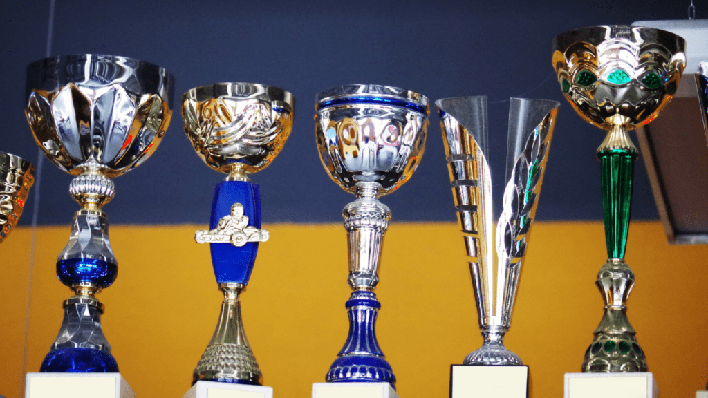 trophies on a yellow background